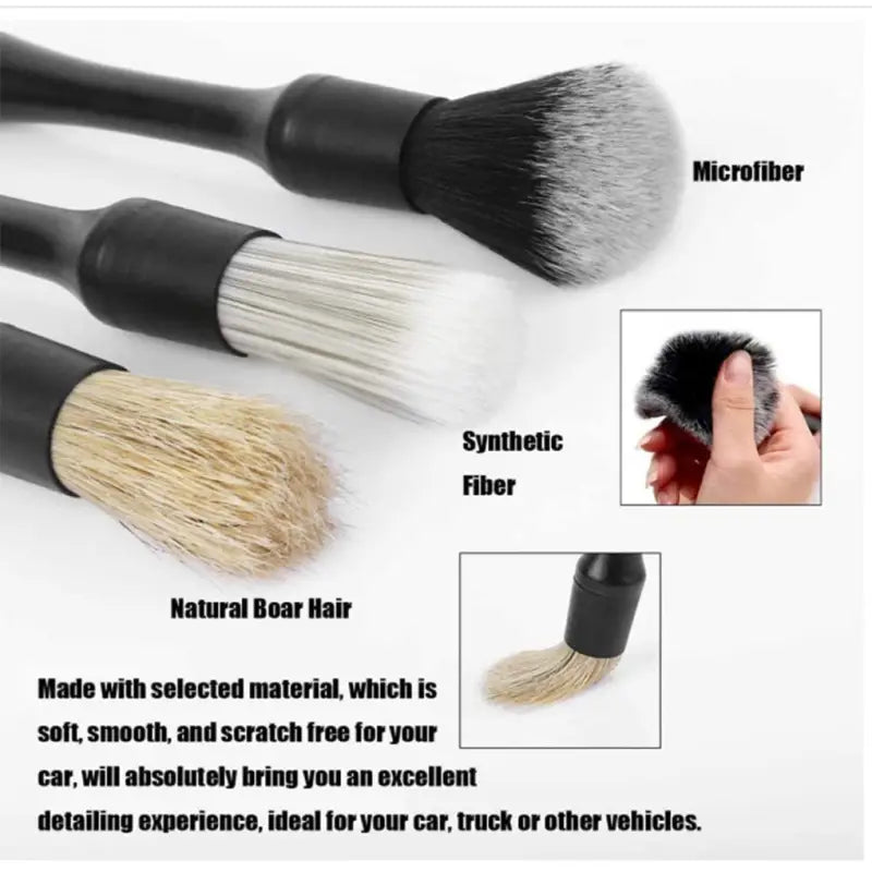 a set of brushes with a black handle