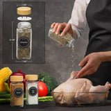 a person is preparing a chicken in a glass jar