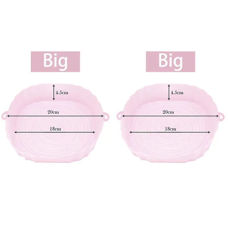 two pink plastic dishes with measurements for each of them