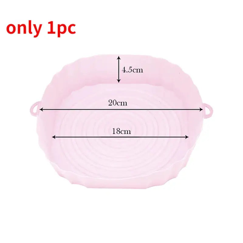 a pink plastic bowl with measurements