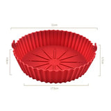 a red cake pan with a large star design on it