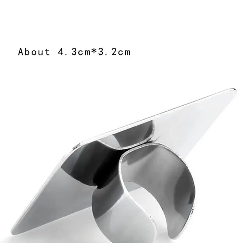 a metal object with a white background