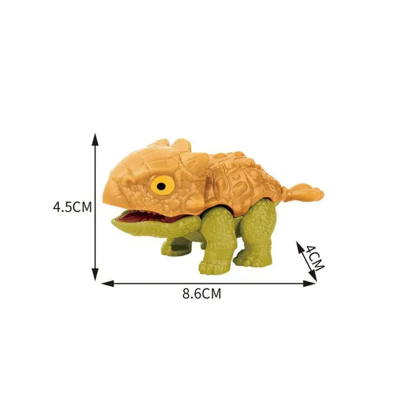a small toy turtle with a large head and a small body