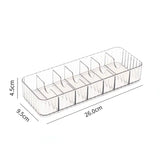 a clear plastic organizer with four compartments