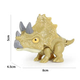 a small toy of a dinosaur with a large head
