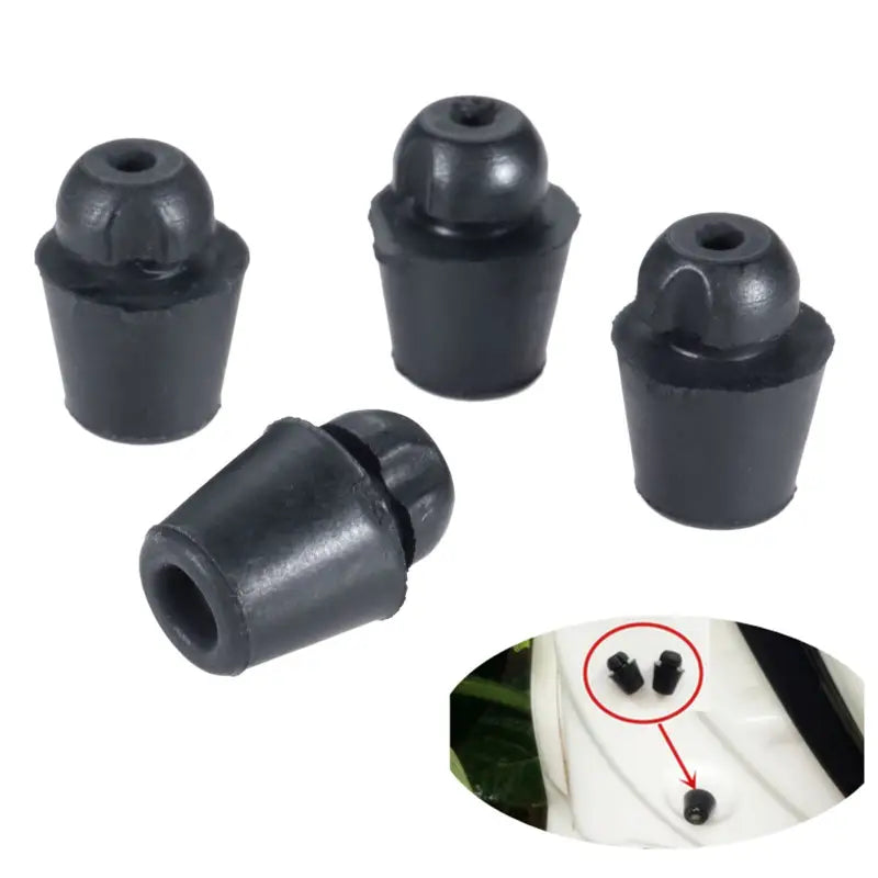 a close up of a bunch of black plastic objects with a red circle