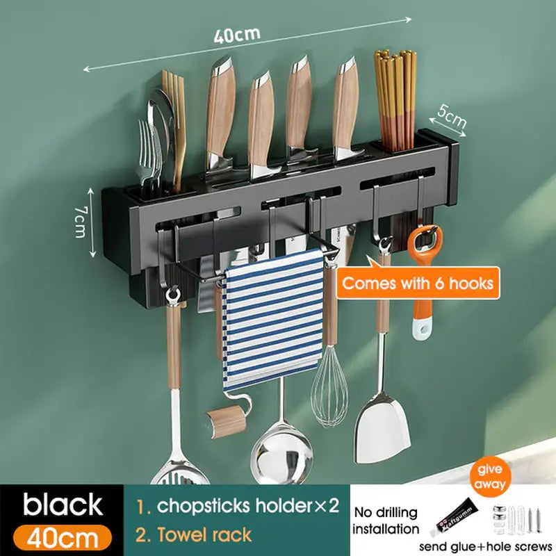 a kitchen rack with uts and uts hanging on it