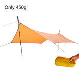 a person holding a yellow and orange tent