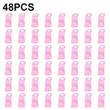 pink plastic bottle clips for bottles, with a white background