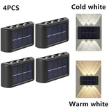 four different types of solar powered outdoor lights with different colors