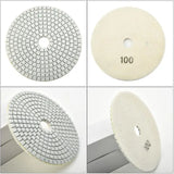 a set of four different types of diamond polish pads
