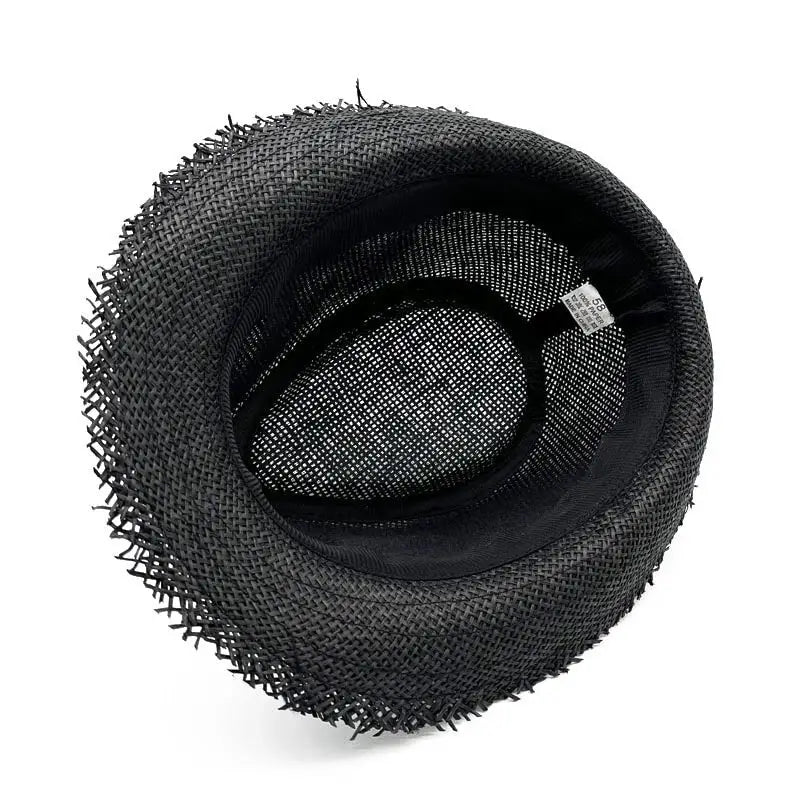 a close up of a black hat with a black band