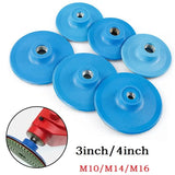 a close up of a bunch of blue discs with a red handle