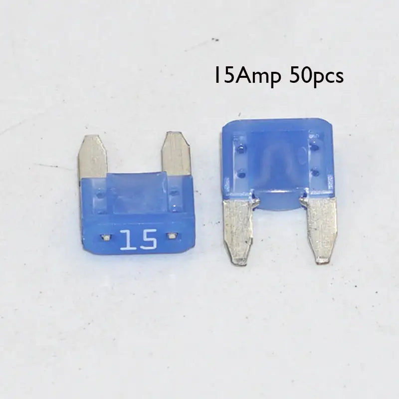 a close up of two blue electrical components on a white surface