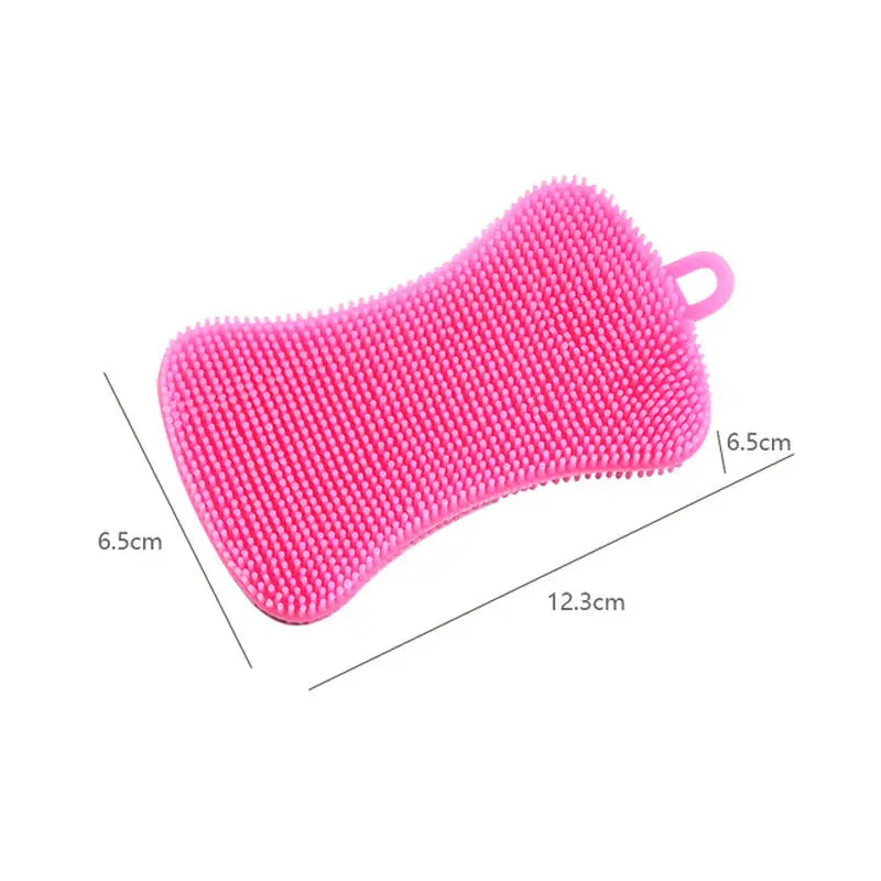 a close up of a pink scrubber with a measuring line