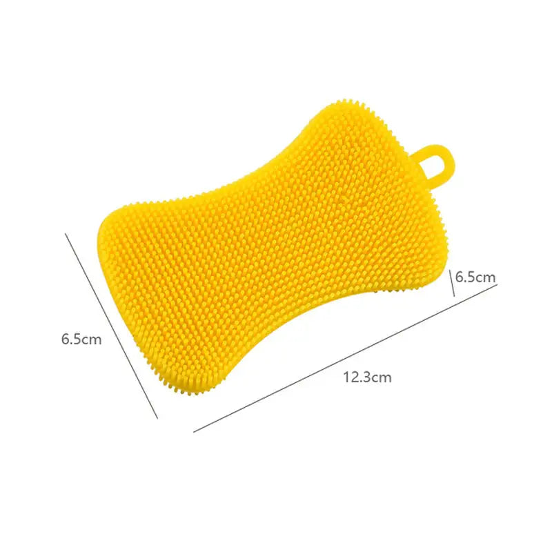 a close up of a yellow scrubber with measurements