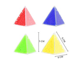 a set of three triangular shaped plastic beads