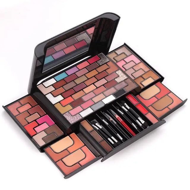 a makeup set with various colors and brushes