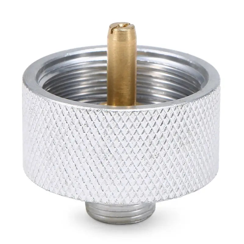 a silver metal ash ash holder with a brass top