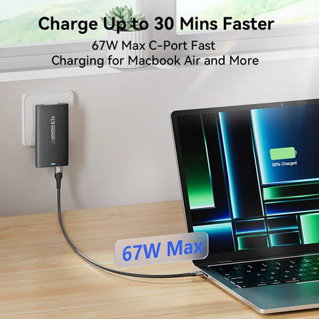 Fast-charging 67W USB-C power adapter for MacBook Air and other devices.