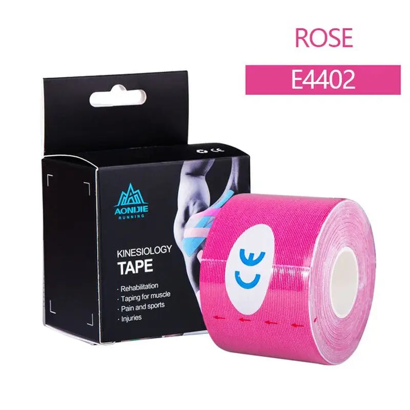 a pink tape with a white background and a black box