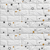 a white brick wall with gold stars