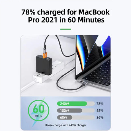 a laptop with a charger and a cable connected to it