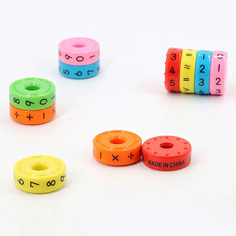 a set of colorful plastic numbers on a white background