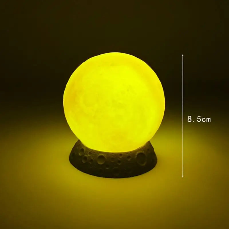 a yellow moon lamp on a black background