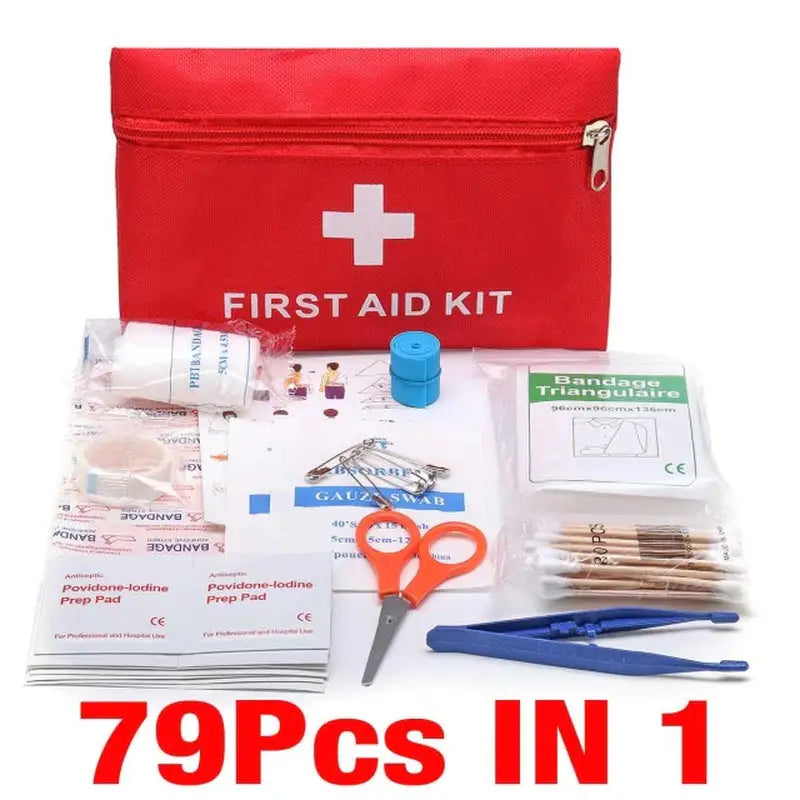 a first aid kit with a red bag and scissors