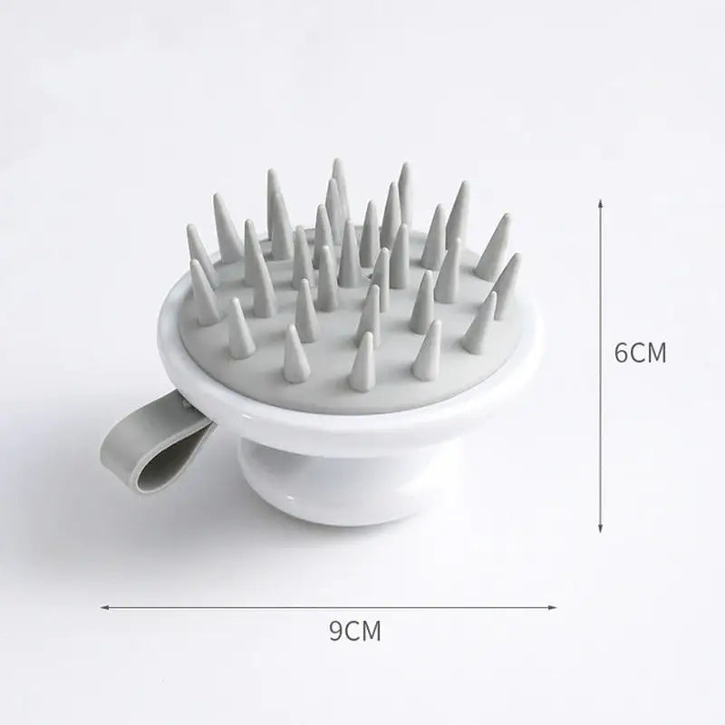a white ceramic brush with a white handle