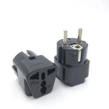 a black adapt plug with two plugs