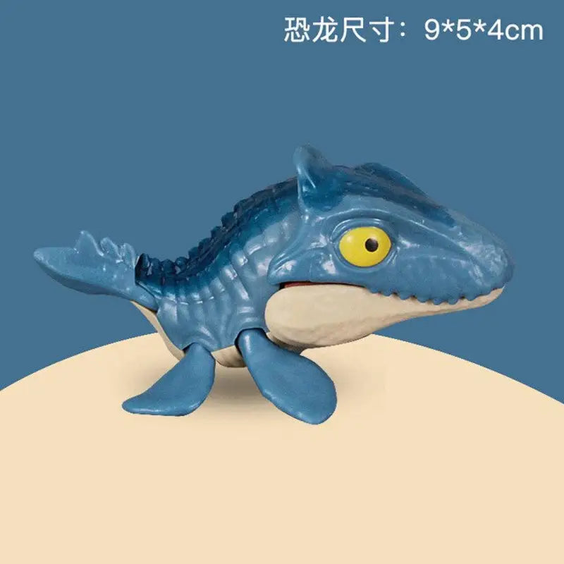 a toy shark with a yellow eye and a blue body