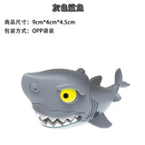 a shark with yellow eyes and a white background