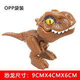 a toy dinosaur with a big mouth and big teeth