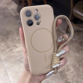 Beige phone case with an attached lanyard and a magnetic charging ring.