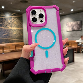 A clear glitter phone case with bright pink edges and a blue magnetic ring.