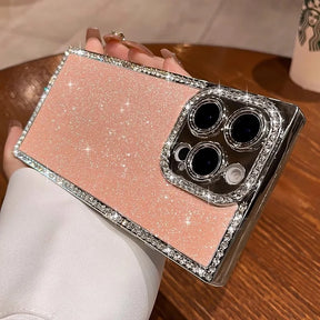 Glittering pink phone case with a diamond-studded camera frame.