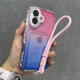 Pink and blue gradient transparent phone case with a pink wrist strap.