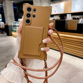 Brown smartphone case with a card slot and a detachable strap.