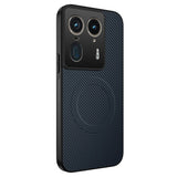 A dark blue carbon fiber textured phone case with a raised black camera module and an embedded magnetic ring.