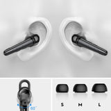 Black wireless earbuds with ear tips.
