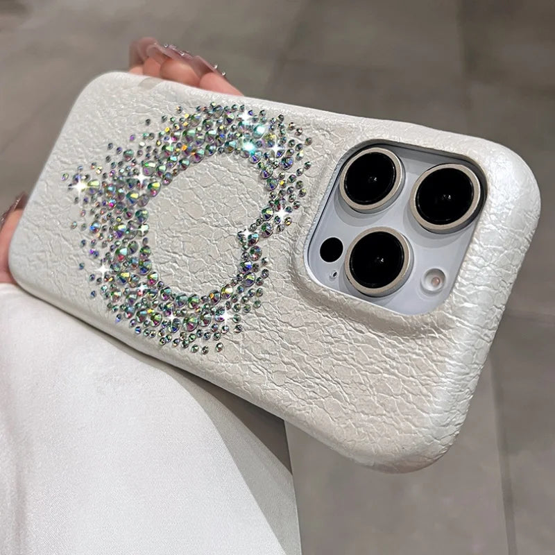 Rhinestone-studded white phone case.