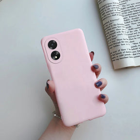 Pink silicone phone case with two circular camera cutouts.