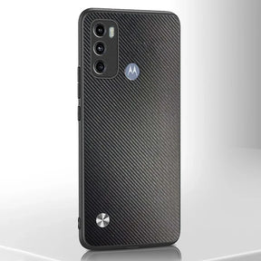A black smartphone with a textured carbon fiber pattern on the back, featuring a triple camera system and a circular metallic accent.