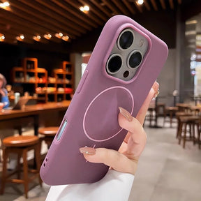 A purple silicone iPhone case with a MagSafe ring.