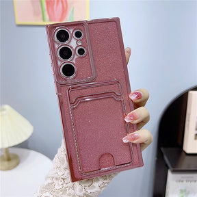 Pink glitter phone case with a camera protector and card slot.