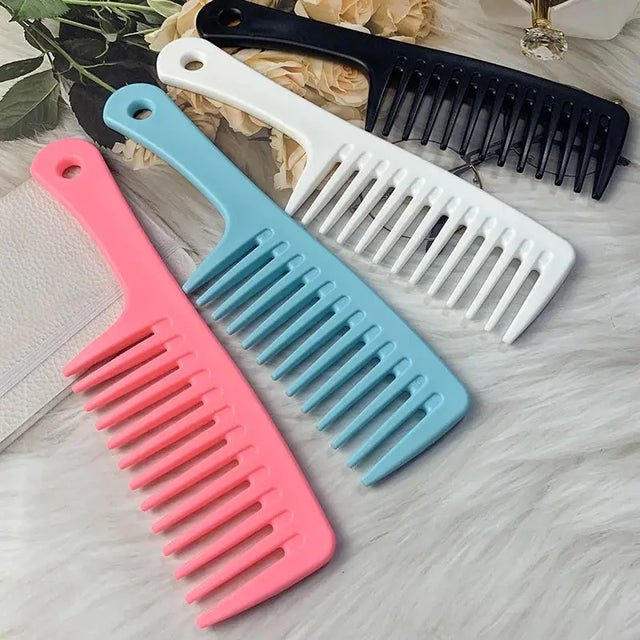 a set of hair combs with a pink and blue comb