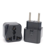 a black adapt plug with two plugs