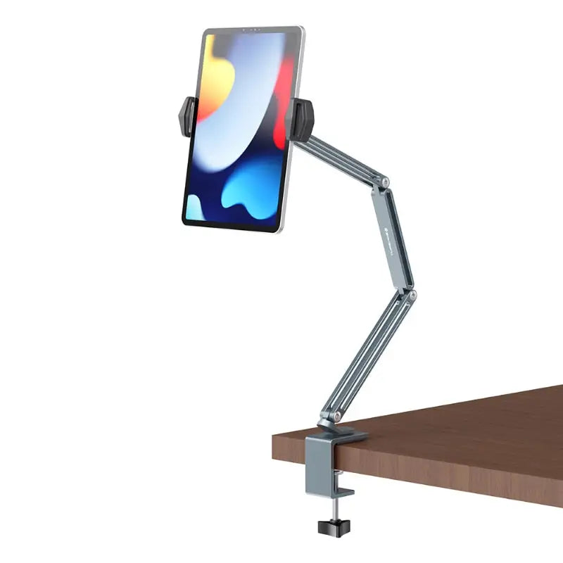 the adjustable desk lamp with a smartphone on it